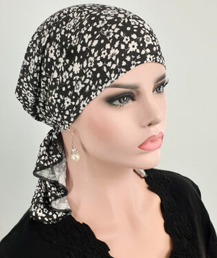 Bandana chemomuts hoofddoek voor haarverlies kleur zwart met witte bloemetjes